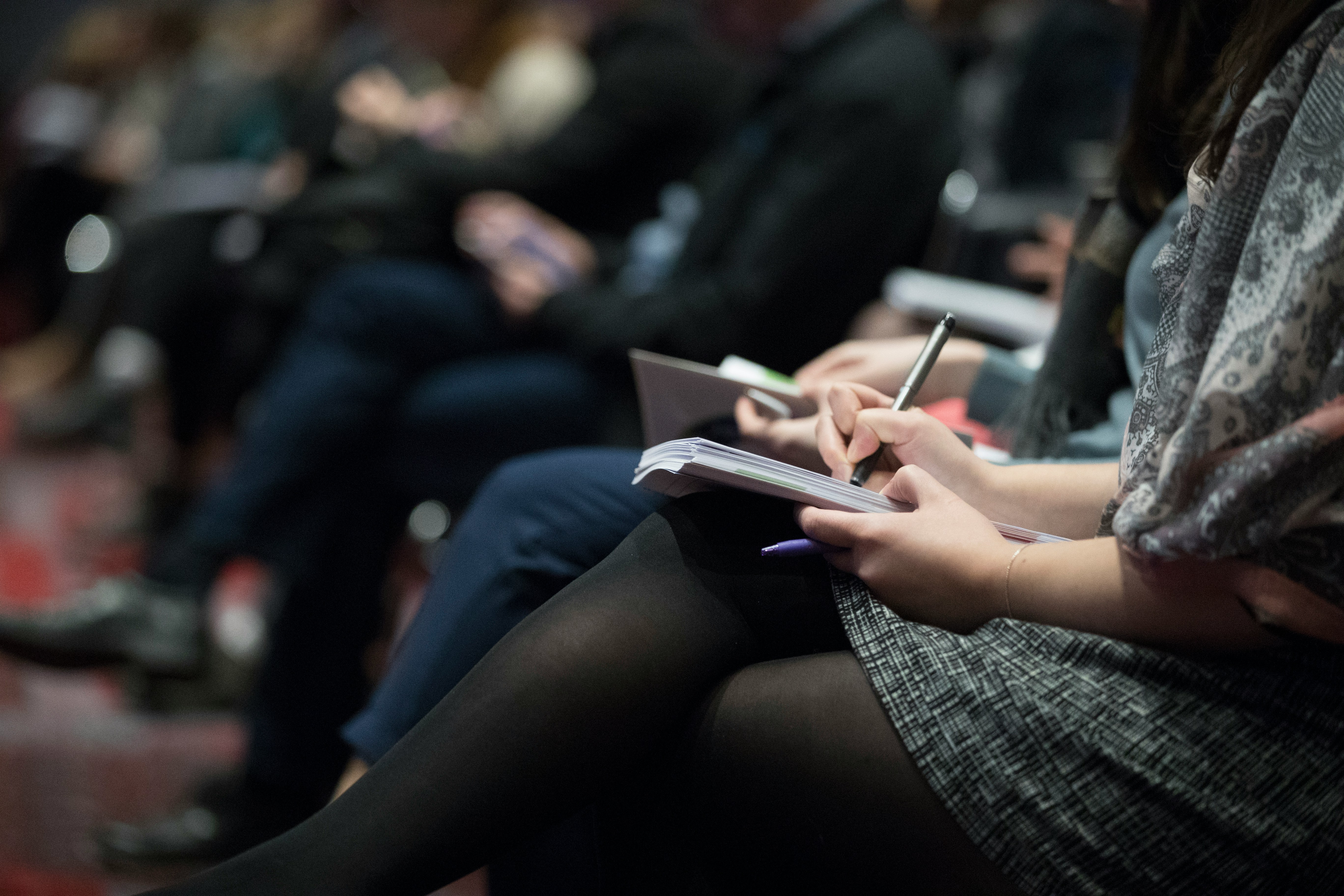 A student taking notes